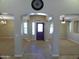 Open foyer with decorative tile, arched doorways, and views into the living spaces at 32071 N Chestnut Trl, San Tan Valley, AZ 85143