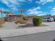 Charming single-story home featuring desert landscaping, a driveway, and a glimpse of clear blue skies at 32071 N Chestnut Trl, San Tan Valley, AZ 85143