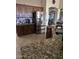 Gourmet kitchen with stainless steel appliances, granite countertops, and custom cabinetry offering style and functionality at 32071 N Chestnut Trl, San Tan Valley, AZ 85143