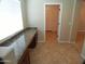 Additional counter and cabinet space is provided in the kitchen area at 32071 N Chestnut Trl, San Tan Valley, AZ 85143