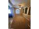 The living room features high ceilings, carpet, and arches at 32071 N Chestnut Trl, San Tan Valley, AZ 85143