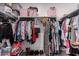 Walk-in closet with ample shelving and rod space for organized storage at 3530 N 310Th Dr, Buckeye, AZ 85396