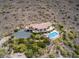 Expansive property featuring a large pool, tennis court, and lush landscaping on a hillside at 36879 N 38Th St, Cave Creek, AZ 85331