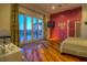 Bright bedroom with glass doors leading to a patio offering scenic mountain views at 36879 N 38Th St, Cave Creek, AZ 85331