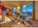 Elegant dining room with modern chandelier lighting and sunset views at 36879 N 38Th St, Cave Creek, AZ 85331