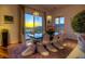 Elegant dining room with modern chandelier lighting and mountain views at 36879 N 38Th St, Cave Creek, AZ 85331