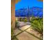 Lush desert landscaping with native plants, stone pavers, and mountain views at 36879 N 38Th St, Cave Creek, AZ 85331
