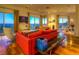 Comfortable living room with scenic views and stylish contemporary furnishings at 36879 N 38Th St, Cave Creek, AZ 85331