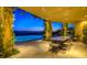 Covered outdoor dining with ivy, seating, mountain views, and pool at 36879 N 38Th St, Cave Creek, AZ 85331