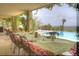 Outdoor dining area with patio furniture, mountain views, and pool at 36879 N 38Th St, Cave Creek, AZ 85331