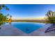 Stunning infinity pool overlooking picturesque desert landscape, perfect for relaxation and entertaining at 36879 N 38Th St, Cave Creek, AZ 85331