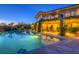 Inviting pool and patio area perfect for outdoor entertaining and relaxation on warm nights at 36879 N 38Th St, Cave Creek, AZ 85331