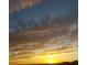 Scenic sunrise with golden clouds against a blue sky at 36879 N 38Th St, Cave Creek, AZ 85331