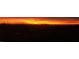 Scenic sunset view over the city lights and mountains in the distance at 36879 N 38Th St, Cave Creek, AZ 85331