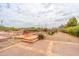 The backyard has a desert landscape and views of the surrounding mountains at 3933 E Rancho Dr, Paradise Valley, AZ 85253