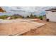 Renovation stage view of the backyard showcasing a patio in progress and mountain views at 3933 E Rancho Dr, Paradise Valley, AZ 85253