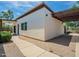 An exterior view showcasing the home's architectural design and desert landscaping at 3933 E Rancho Dr, Paradise Valley, AZ 85253