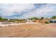 Property showing new construction and a gravel yard at 3933 E Rancho Dr, Paradise Valley, AZ 85253
