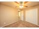 Bedroom with closet and ceiling fan at 43639 W Blazen Trl, Maricopa, AZ 85138