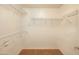 Walk in closet with built in wire shelving at 43639 W Blazen Trl, Maricopa, AZ 85138