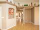 Hallway with neutral paint and tile flooring at 43639 W Blazen Trl, Maricopa, AZ 85138