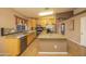Well-appointed kitchen with stainless steel appliances and granite countertops at 43639 W Blazen Trl, Maricopa, AZ 85138