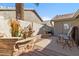 Cozy backyard patio with a water fountain feature, perfect for outdoor relaxation at 4502 E Hartford Ave, Phoenix, AZ 85032