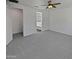 Neutral bedroom with carpet, ceiling fan and closet at 4806 N 186Th Ln, Goodyear, AZ 85395