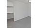Bedroom featuring a ceiling fan and walk-in closet at 4806 N 186Th Ln, Goodyear, AZ 85395
