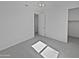 Neutral bedroom with carpet, ceiling fan and closet at 4806 N 186Th Ln, Goodyear, AZ 85395