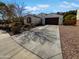 Charming single-story home featuring a well-manicured front yard and a spacious two-car garage at 4806 N 186Th Ln, Goodyear, AZ 85395
