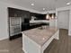 Gourmet kitchen with stainless steel appliances and large island at 4806 N 186Th Ln, Goodyear, AZ 85395
