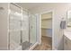 Modern bathroom featuring a walk-in shower with white subway tile and a sliding glass door at 5628 S Winchester --, Mesa, AZ 85212