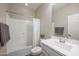 Bathroom with a shower-tub combination, bright vanity, and a large mirror to create a serene and functional space at 5628 S Winchester --, Mesa, AZ 85212