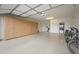 Spacious garage with ample storage cabinets, epoxy floor, and bike rack, perfect for organization and activities at 5628 S Winchester --, Mesa, AZ 85212