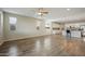 Bright and airy living area featuring an open floor plan, recessed lighting, and a view of the kitchen at 5628 S Winchester --, Mesa, AZ 85212