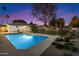 Fenced backyard pool offering privacy and a refreshing oasis, with a large shade tree at 623 E Winter Drive Dr, Phoenix, AZ 85020