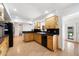 Functional kitchen with wood cabinets, black appliances, and plenty of counter space at 623 E Winter Drive Dr, Phoenix, AZ 85020