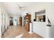 Bright sunroom with wood floors, open layout, and views to living room and backyard at 623 E Winter Drive Dr, Phoenix, AZ 85020