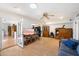 Spacious living room with wood floors, open layout, and access to the kitchen at 623 E Winter Drive Dr, Phoenix, AZ 85020