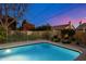 Sparkling swimming pool with a white fence surround, perfect for relaxing and entertaining at 623 E Winter Drive Dr, Phoenix, AZ 85020
