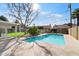 Refreshing backyard pool surrounded by a concrete deck, perfect for relaxing and entertaining at 623 E Winter Drive Dr, Phoenix, AZ 85020