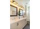 Elegant bathroom with a double vanity, modern fixtures, and well-lit mirrors at 6858 E Orion Dr, Scottsdale, AZ 85257