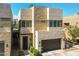 Contemporary home showcasing mixed materials, clean lines, and a well-manicured yard at 6858 E Orion Dr, Scottsdale, AZ 85257