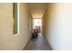Exterior view of a narrow pathway with neutral colored walls at 6858 E Orion Dr, Scottsdale, AZ 85257