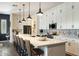 Bright kitchen featuring a large island, stainless steel appliances, and ample cabinet space for storage at 6858 E Orion Dr, Scottsdale, AZ 85257