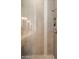 Shower with a glass door and bench at 6858 E Orion Dr, Scottsdale, AZ 85257