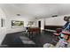Spacious basement game room with foosball, arcade games, and custom built-ins for ultimate entertainment at 7014 E Palo Verde Ln, Paradise Valley, AZ 85253