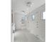 Luxurious walk-in shower with dual shower heads and sleek, modern design with white marble at 7014 E Palo Verde Ln, Paradise Valley, AZ 85253