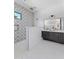 Stunning bathroom featuring dual vanity sinks, tiled walls, and a modern walk-in shower at 7014 E Palo Verde Ln, Paradise Valley, AZ 85253